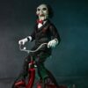 Figura Billy the Puppet En Triciclo Saw Con Sonido. Neca